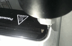 電磁爐涂膠機(jī)